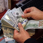 Dollar dips against dong on black market.